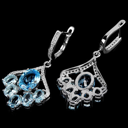 Blautopas Schaukel-Ohrringe aus 925 Silber mit Swiss- und Sky-Blue-Topasen – Vorder- und Rückansicht