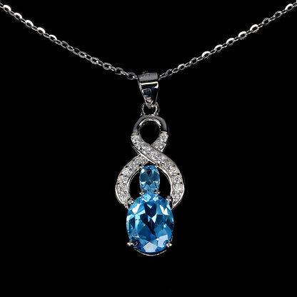 Blautopas Anhänger mit Halskette aus weißvergoldetem Silber - INARA