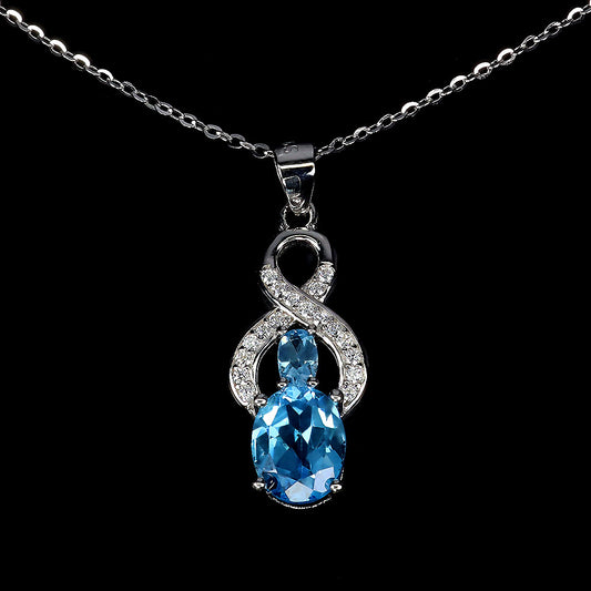 Blautopas Anhänger mit Halskette aus weißvergoldetem Silber - INARA