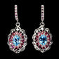 Boucles d'oreilles topaze bleue rhodolite bleu suisse