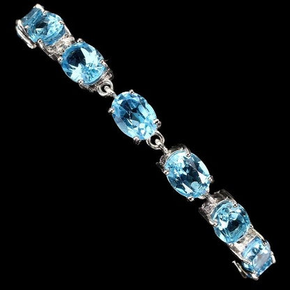 Armband Blautopas Swiss Blue 8x6 mm 925 Silber 585 Weißgold vergoldet Silber - INARA